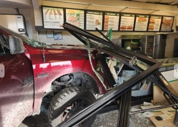 Driver Crashes into Aurora Subway, Injures Worker, and Arrested at Home